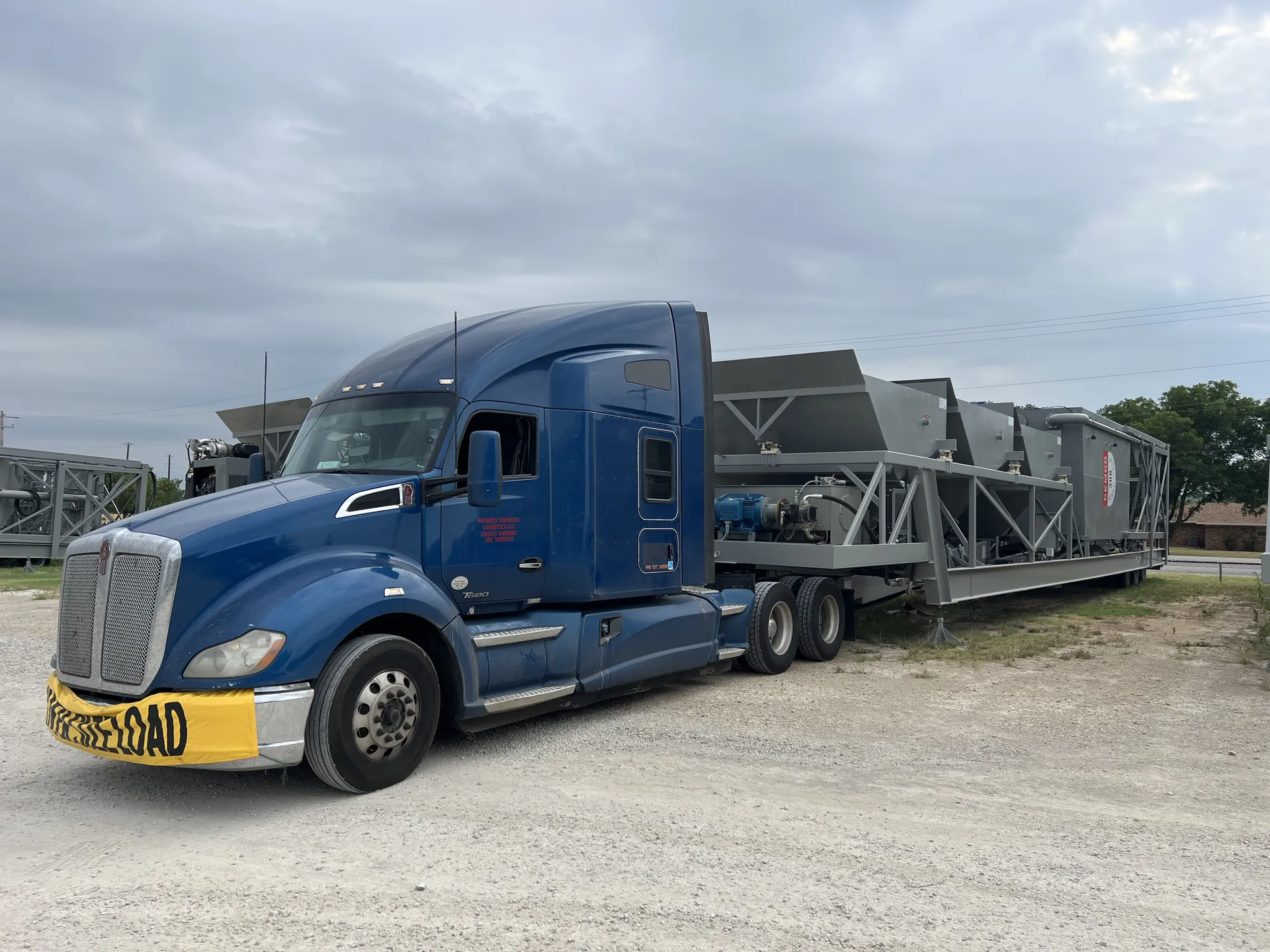 Patriot Services hauling oversized modular building frames